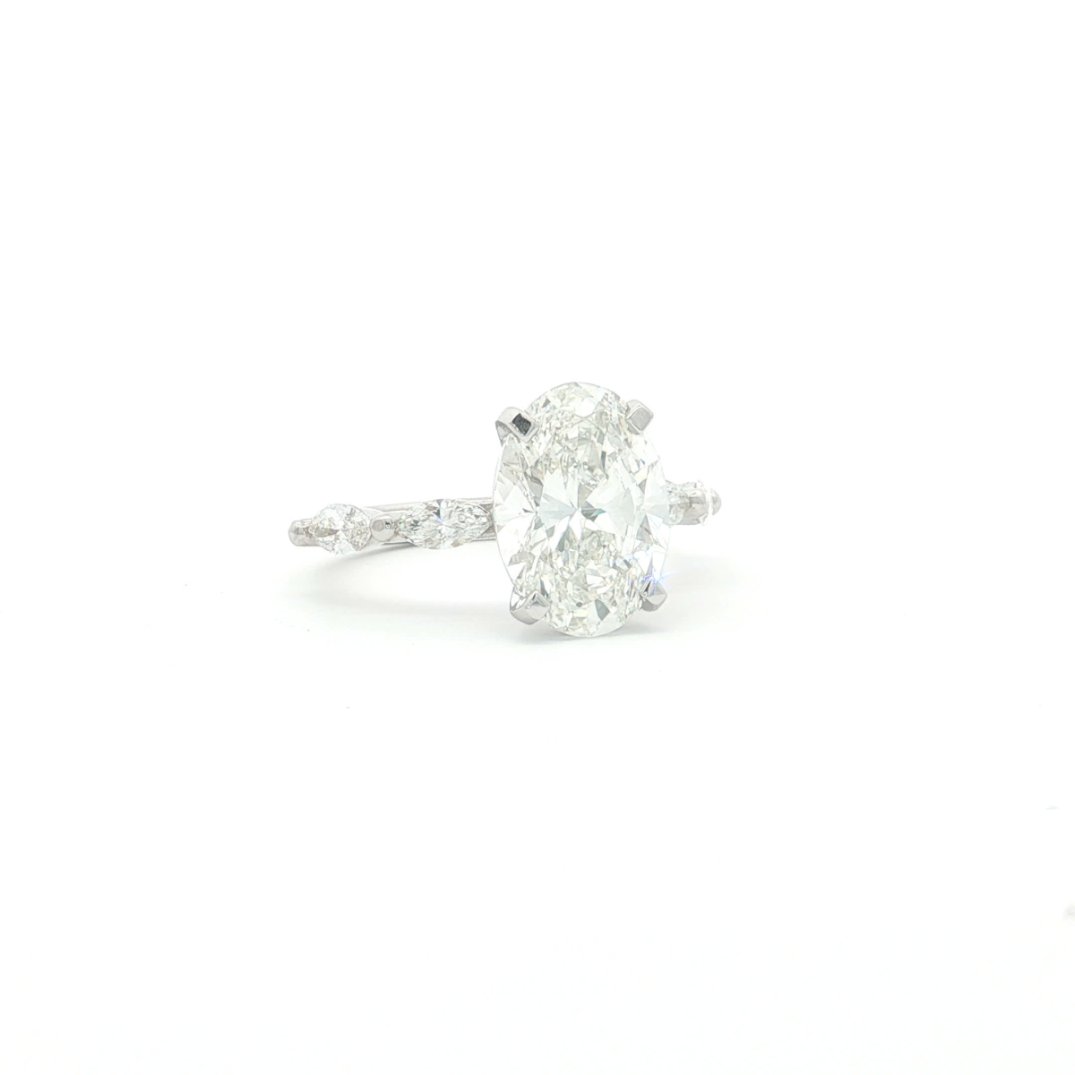 Oval Cut Diamond Ring in White Gold