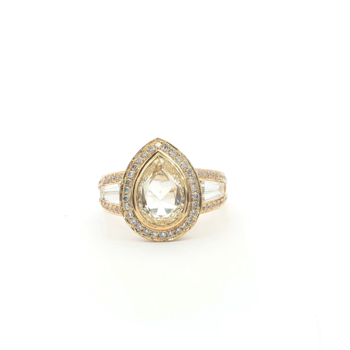 Fancy Yellow Pear Cut Diamond Halo Ring