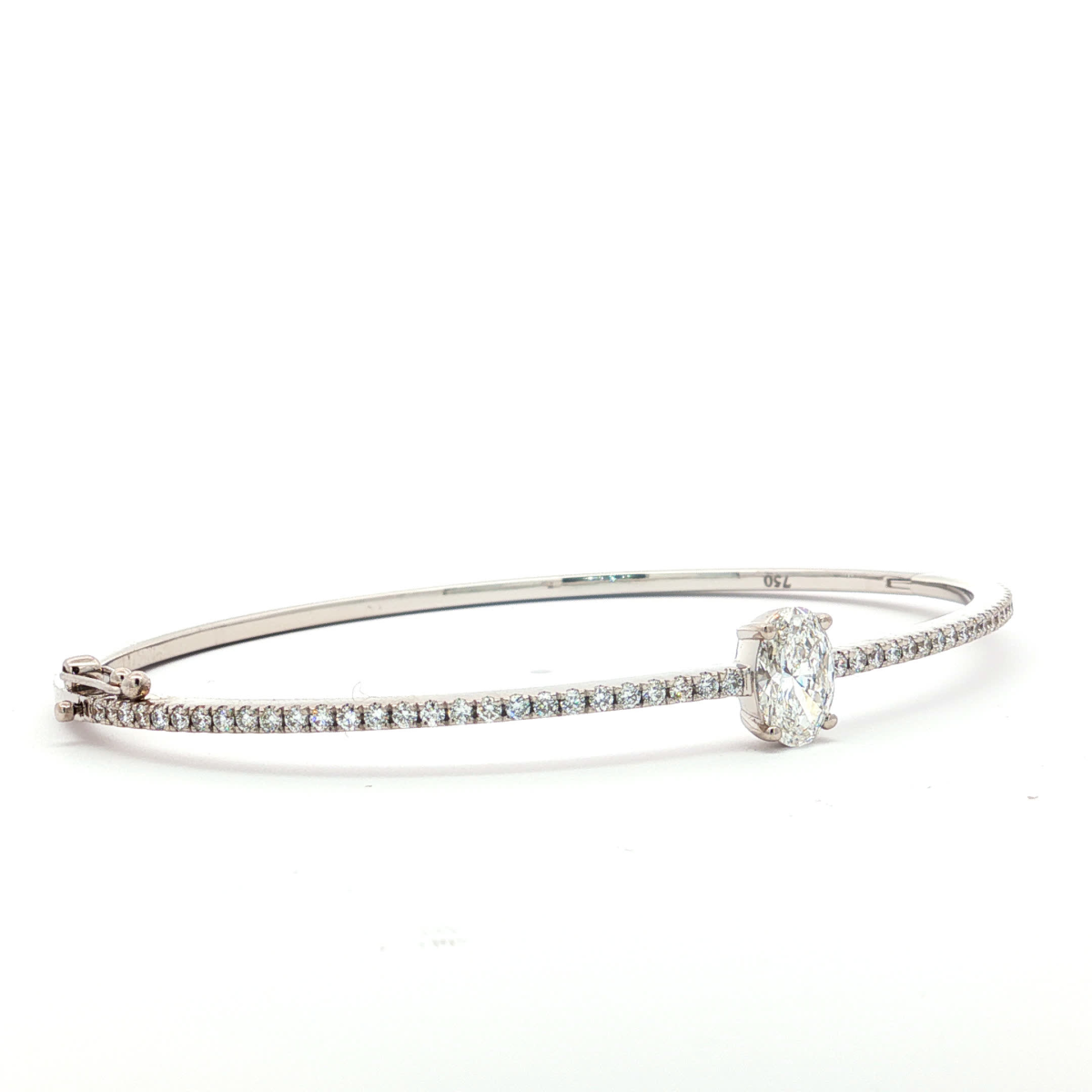 Oval Cut Diamond Bangle in White Gold
