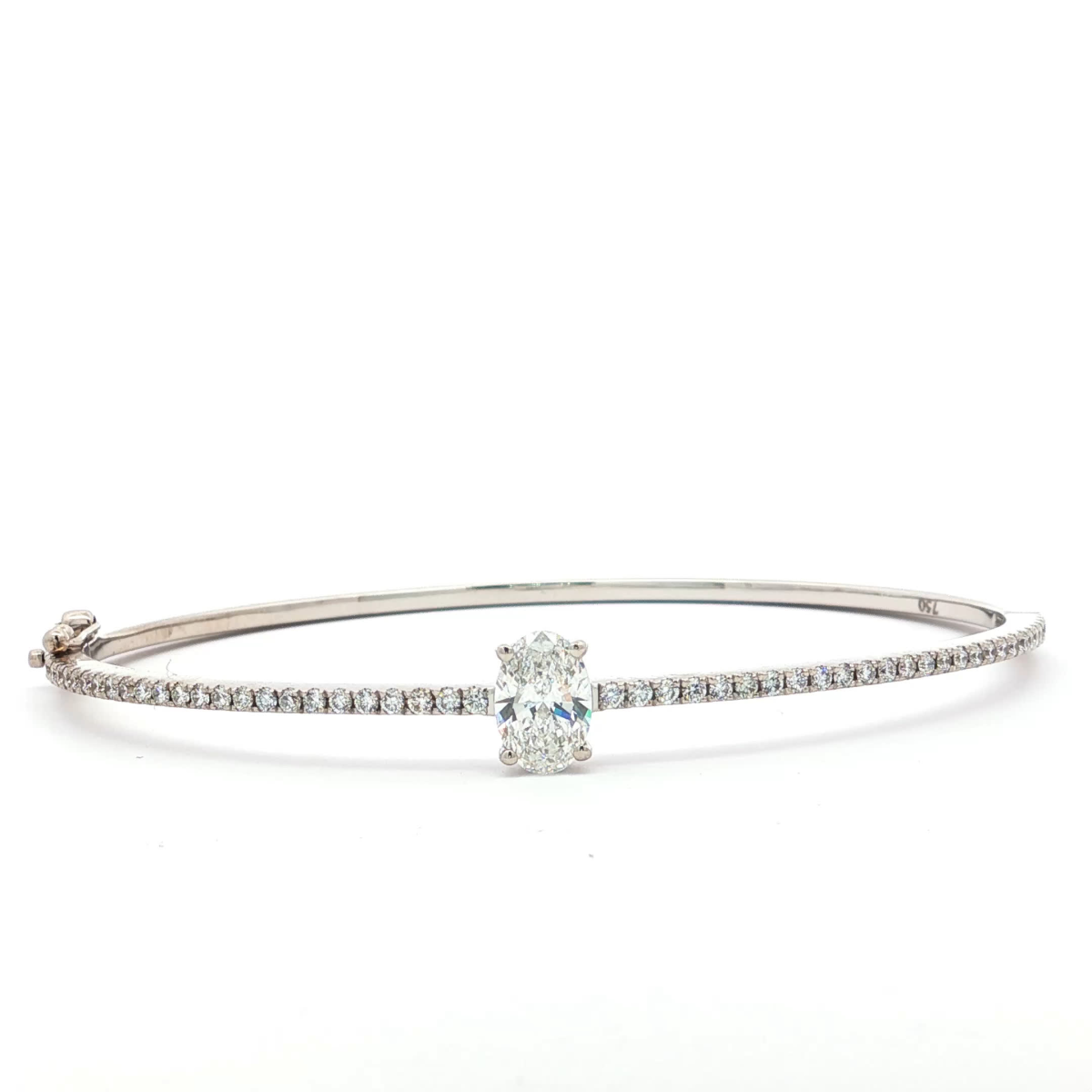 Oval Cut Diamond Bangle in White Gold