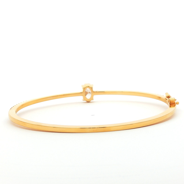 Oval Cut Diamond Bangle in Yellow Gold