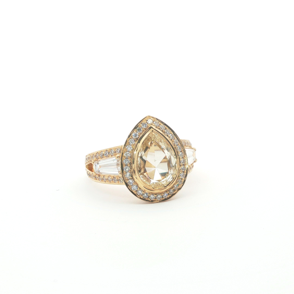 Fancy Yellow Pear Cut Diamond Halo Ring