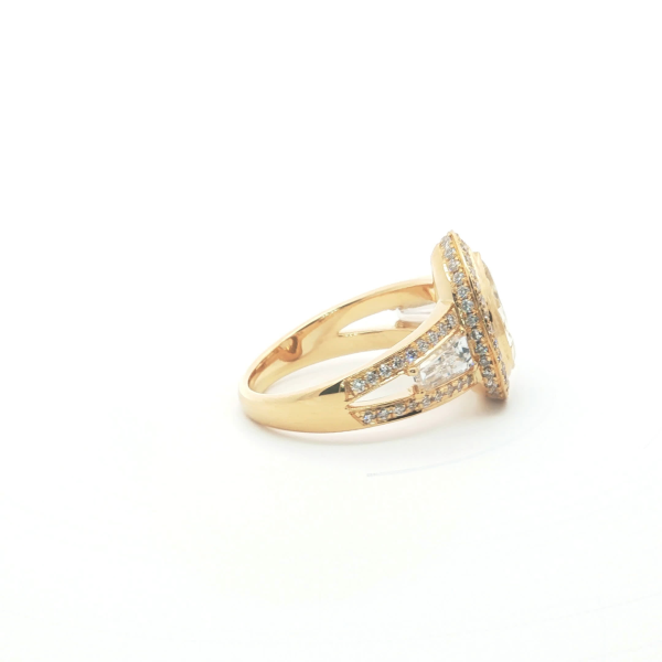 Fancy Yellow Pear Cut Diamond Halo Ring